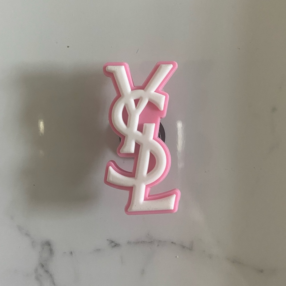 Pink designer crocs charms